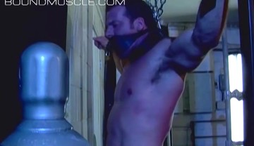Muscular stud Derek Pain bound and flogged